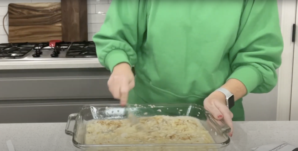 Lindsay mixing together the rice, water, and two condensed soups