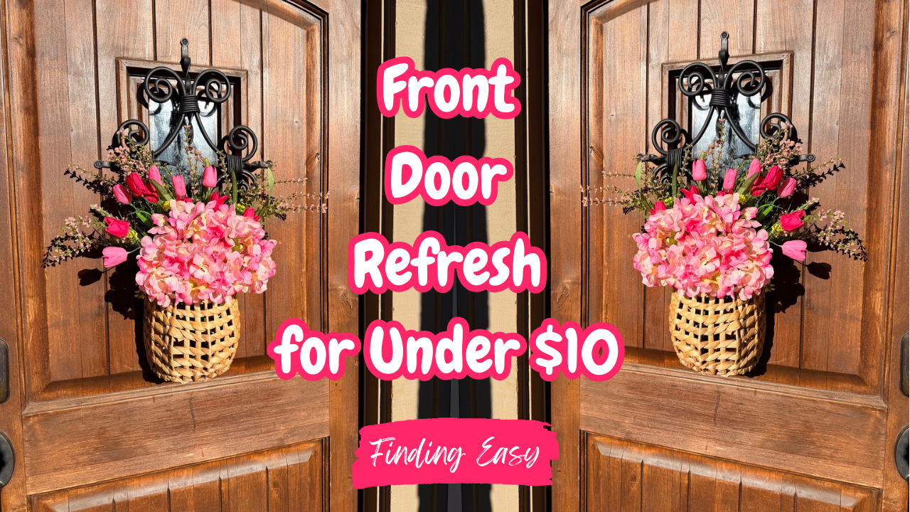 Simple spring front door decor with greenery wreath and floral accents from Walmart for under $10.